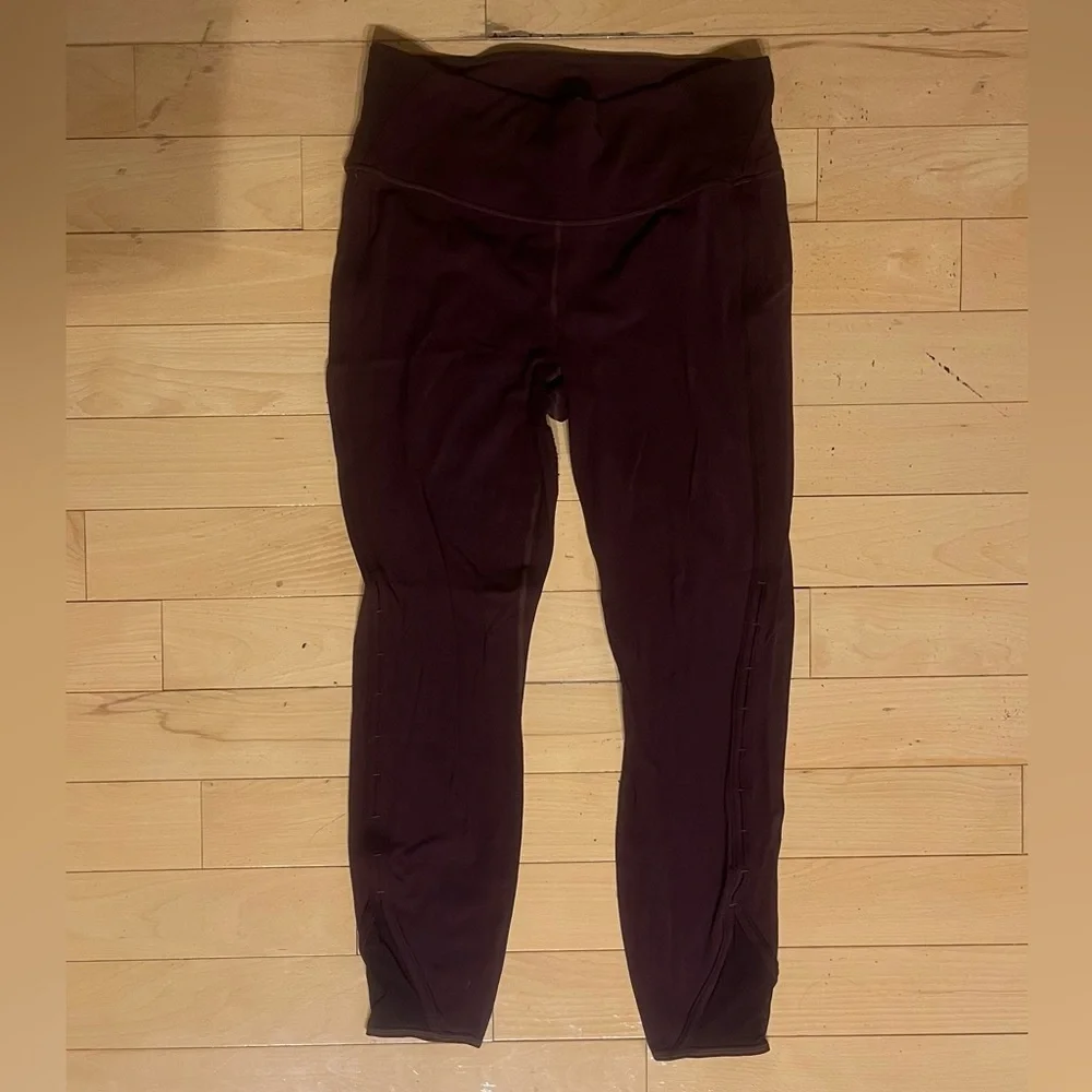 Athleta High-Rise Powervita Peekaboo 7/8 Tight in Maroon - Picture 2 of 14